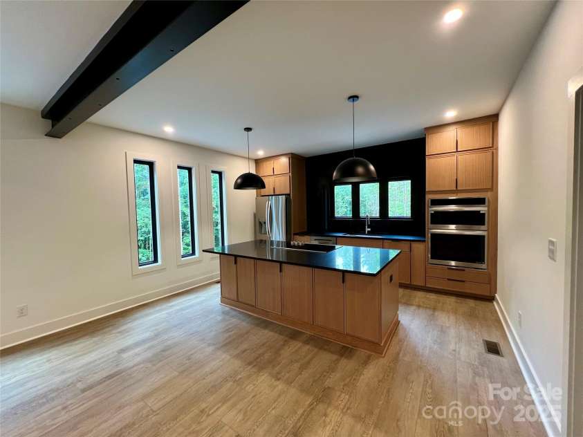 908 Apex Drive, Albemarle, NC 28001.  MLS# CAR4268811, YatesRealty ID 18354. Kitchen with low profile cabinets