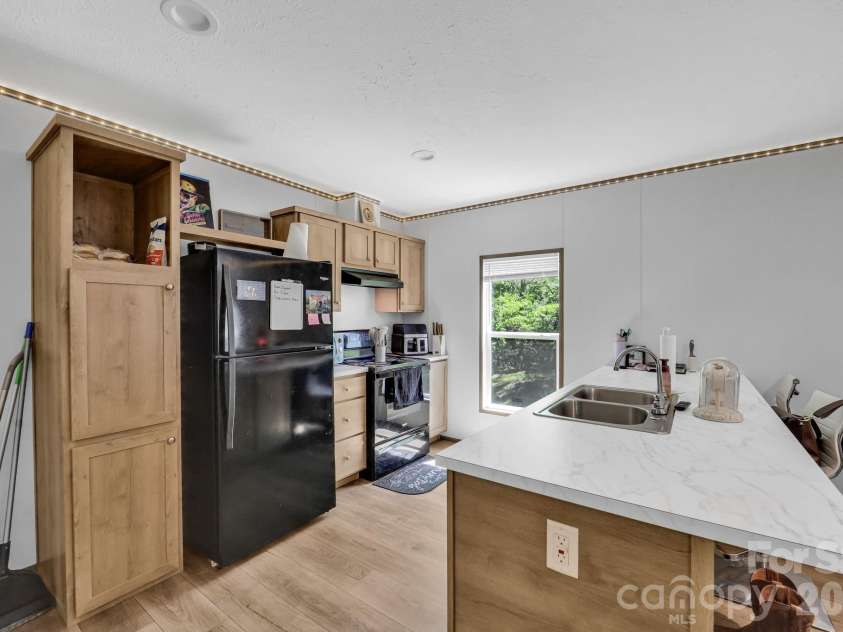 30 Little Rock Road, Newland, NC 28657.  MLS# CAR4377605, YatesRealty ID 18355. Kitchen Unit 100