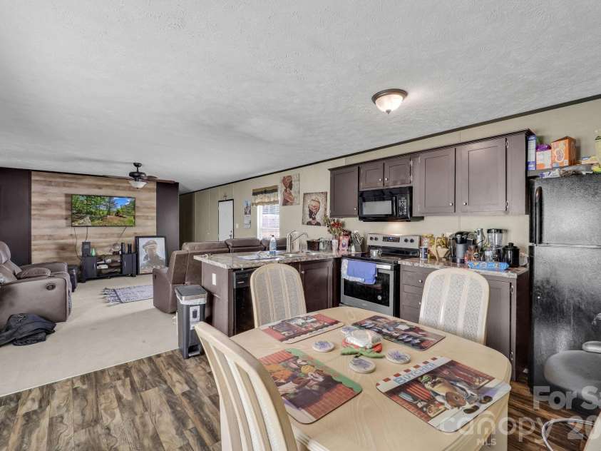 30 Little Rock Road, Newland, NC 28657.  MLS# CAR4377605, YatesRealty ID 18355. Kitchen unit 11 - Park owned