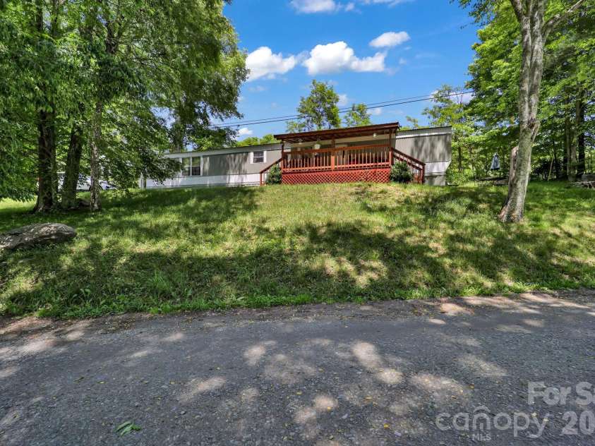 30 Little Rock Road, Newland, NC 28657.  MLS# CAR4377605, YatesRealty ID 18355. Tenant owned unit