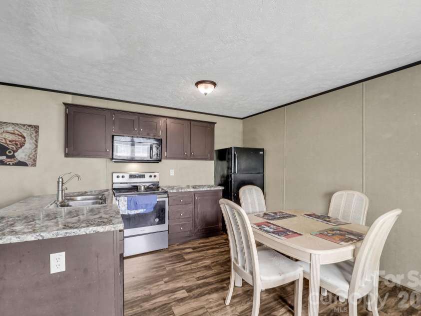 30 Little Rock Road, Newland, NC 28657.  MLS# CAR4377605, YatesRealty ID 18355. Unit 11 - Kitchen - Park owned