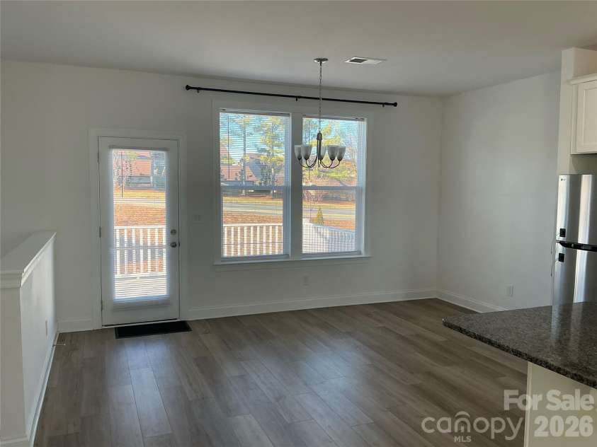 9240 Walnut Hill Road, Concord, NC 28027.  MLS# CAR4330355, YatesRealty ID 18358. Dining room/area opens to deck