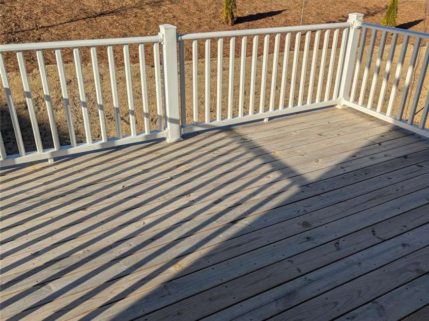 9240 Walnut Hill Road, Concord, NC 28027.  MLS# CAR4330355, YatesRealty ID 18358. Upper level extended option deck