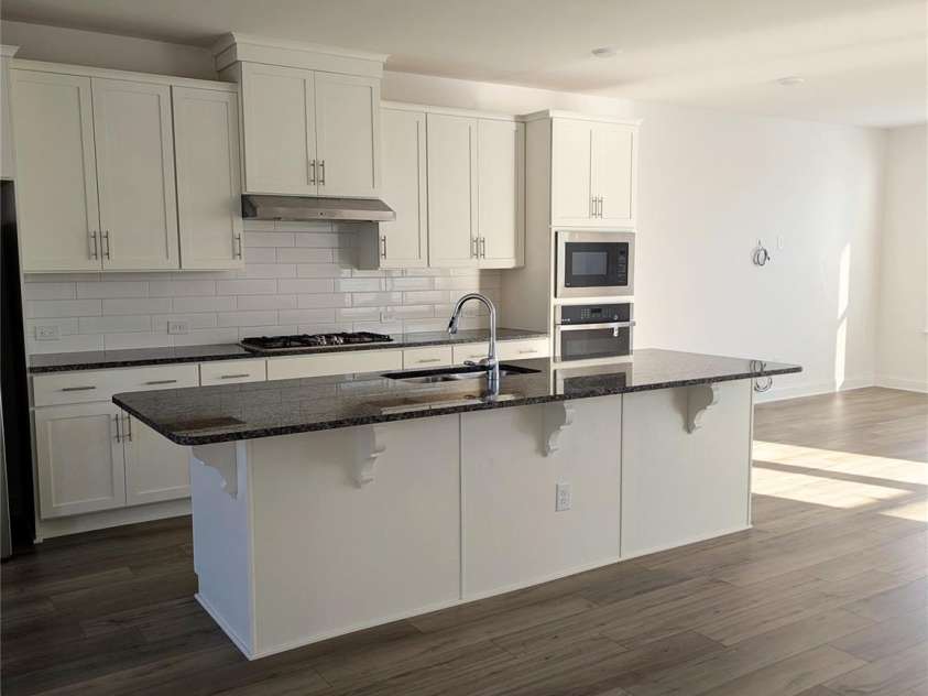 9240 Walnut Hill Road, Concord, NC 28027.  MLS# CAR4330355, YatesRealty ID 18358. Upper level open floor plan. Gourmet kitchen