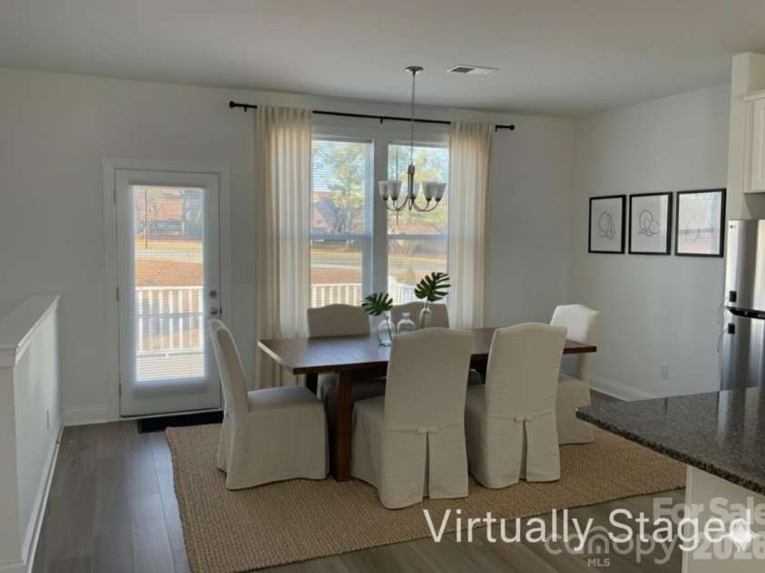 9240 Walnut Hill Road, Concord, NC 28027.  MLS# CAR4330355, YatesRealty ID 18358. Virtually staged dining area