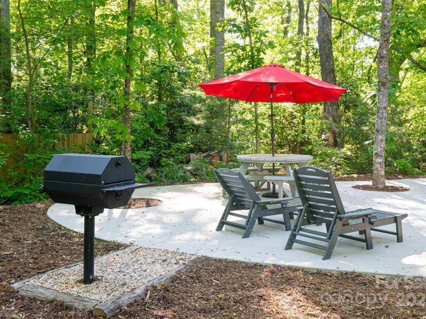 103 Blue Sky Lane, Hendersonville, NC 28792.  MLS# CAR4268920, YatesRealty ID 18359. Fire pit and grill