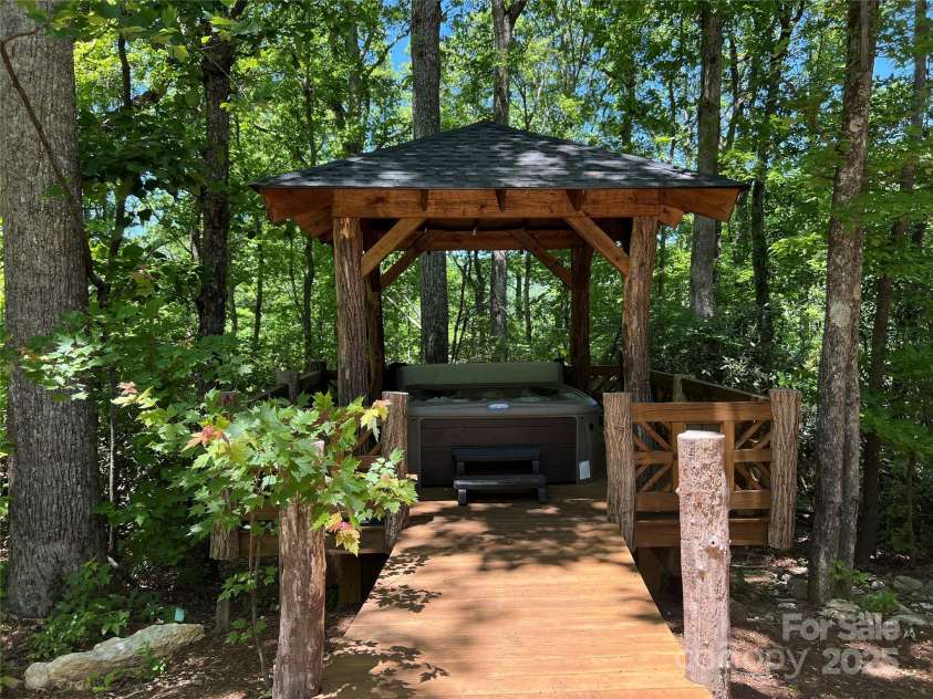103 Blue Sky Lane, Hendersonville, NC 28792.  MLS# CAR4268920, YatesRealty ID 18359. Hot tub