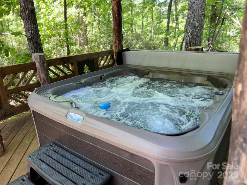 103 Blue Sky Lane, Hendersonville, NC 28792.  MLS# CAR4268920, YatesRealty ID 18359. Hot tub