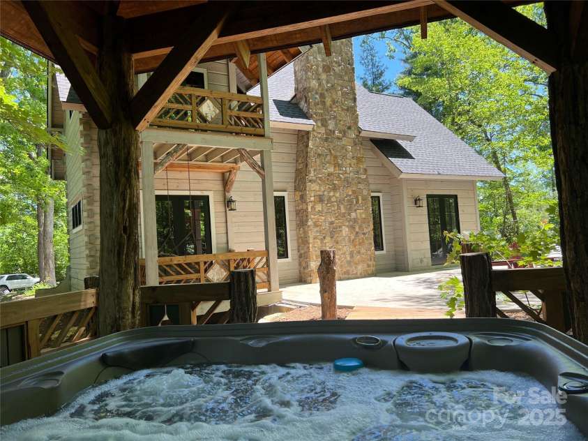 103 Blue Sky Lane, Hendersonville, NC 28792.  MLS# CAR4268920, YatesRealty ID 18359. Hot tub