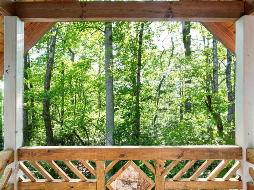 103 Blue Sky Lane, Hendersonville, NC 28792.  MLS# CAR4268920, YatesRealty ID 18359. Private deck off upper bedroom
