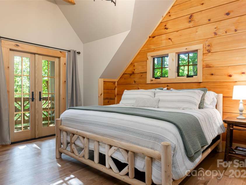103 Blue Sky Lane, Hendersonville, NC 28792.  MLS# CAR4268920, YatesRealty ID 18359. Upper guest bedroom 1
