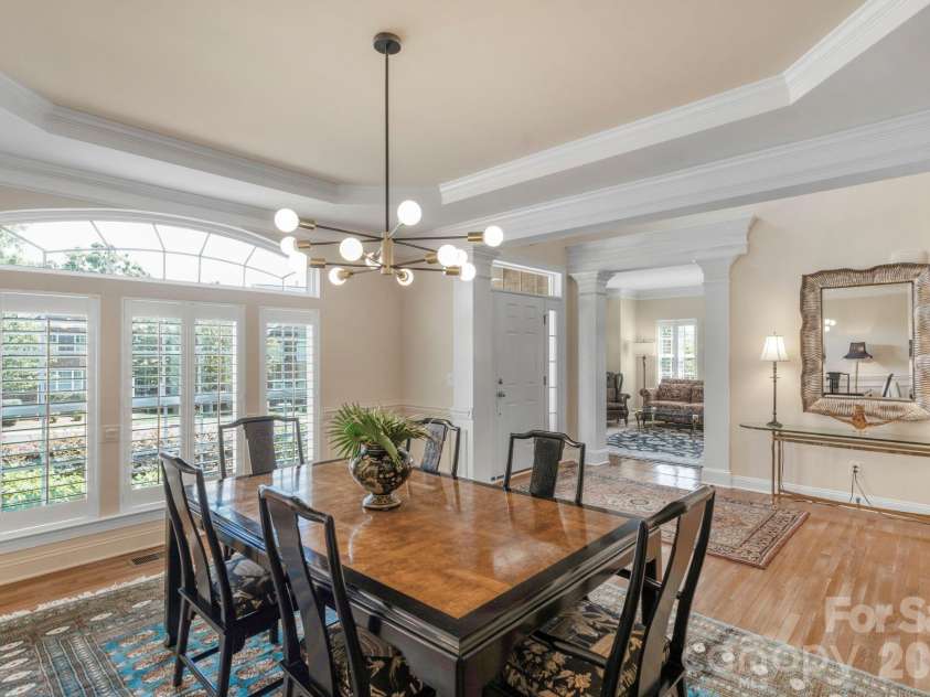 7122 Yellowhorn Trail, Waxhaw, NC 28173.  MLS# CAR4310525, YatesRealty ID 18360. Elegant Dining with tray ceiling 