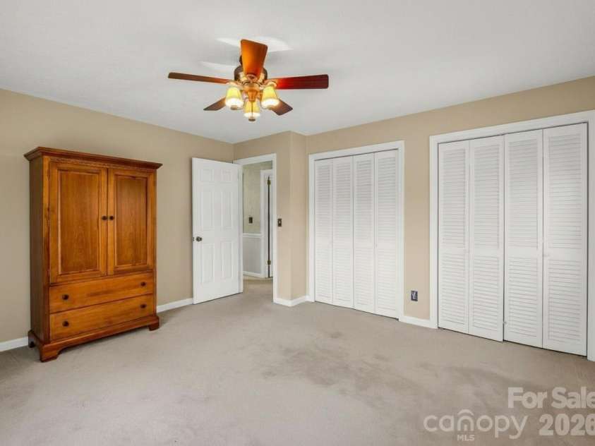 1867 Fruitland Road, Hendersonville, NC 28792.  MLS# CAR4322794, YatesRealty ID 18363. Bedroom two has double closets
