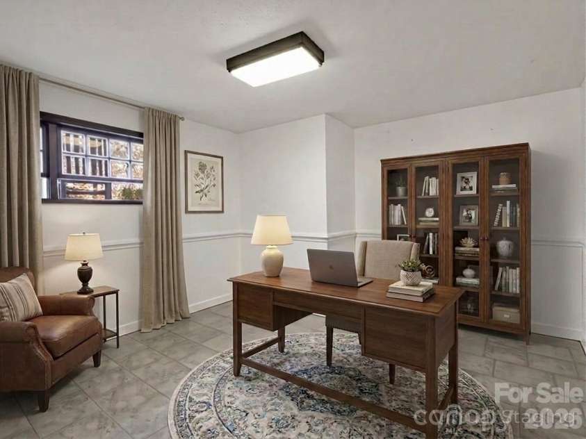 1867 Fruitland Road, Hendersonville, NC 28792.  MLS# CAR4322794, YatesRealty ID 18363. Flex room virtually staged as a home office