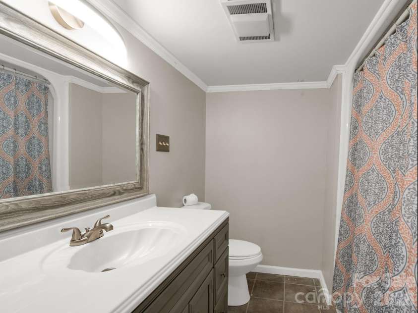 1867 Fruitland Road, Hendersonville, NC 28792.  MLS# CAR4322794, YatesRealty ID 18363. Full bath in lower level