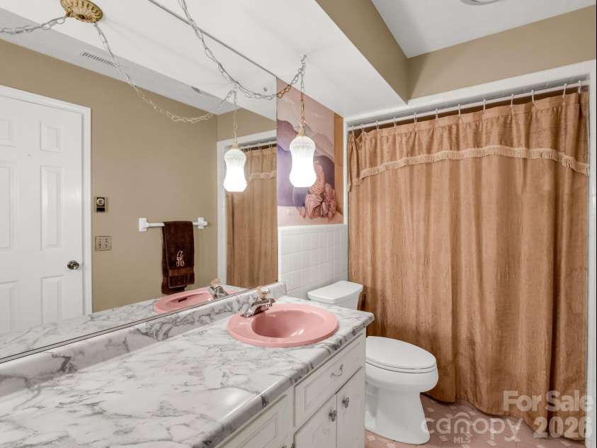 1867 Fruitland Road, Hendersonville, NC 28792.  MLS# CAR4322794, YatesRealty ID 18363. Hall bath
