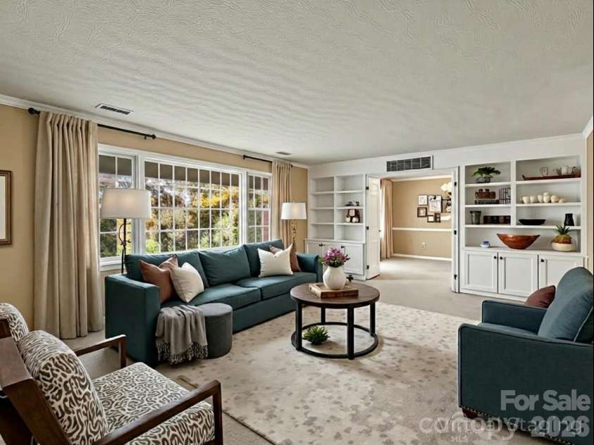 1867 Fruitland Road, Hendersonville, NC 28792.  MLS# CAR4322794, YatesRealty ID 18363. Living room virtually staged