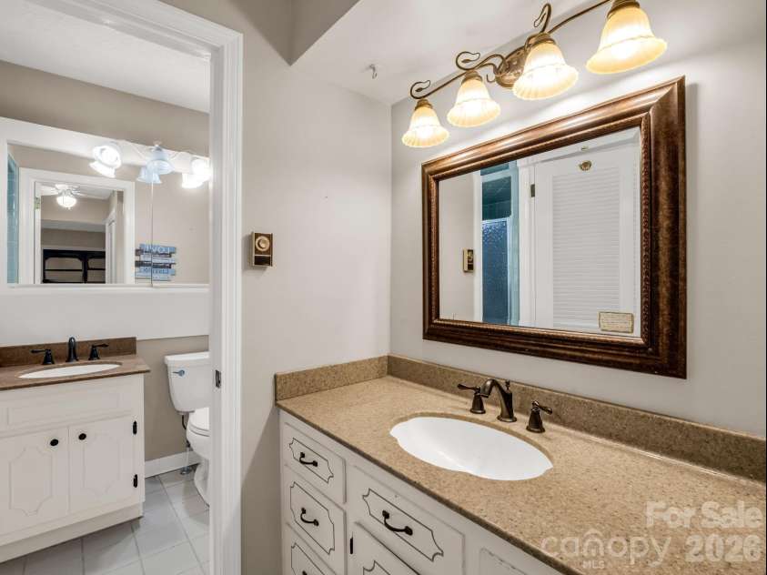 1867 Fruitland Road, Hendersonville, NC 28792.  MLS# CAR4322794, YatesRealty ID 18363. Primary bath with separate dressing area