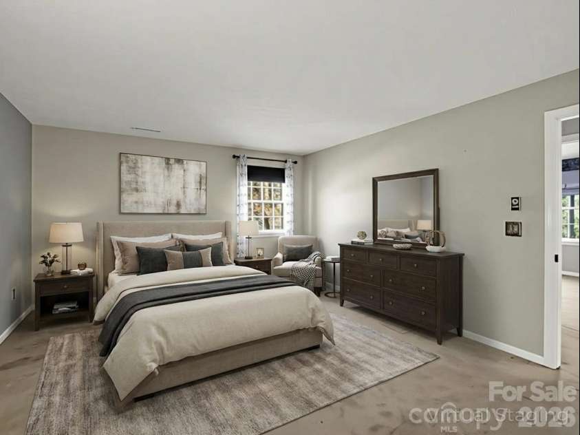 1867 Fruitland Road, Hendersonville, NC 28792.  MLS# CAR4322794, YatesRealty ID 18363. Primary bedroom virtually staged