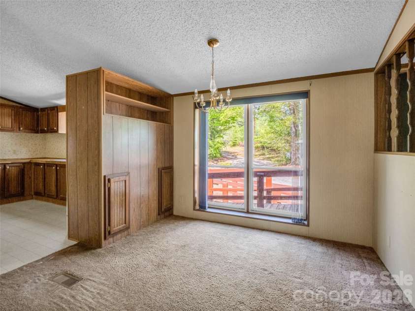 203 Rogat Road, Hendersonville, NC 28792.  MLS# CAR4375541, YatesRealty ID 18365. 