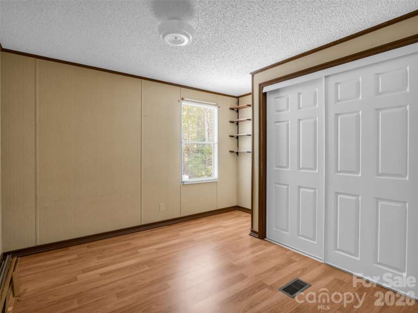 203 Rogat Road, Hendersonville, NC 28792.  MLS# CAR4375541, YatesRealty ID 18365. 