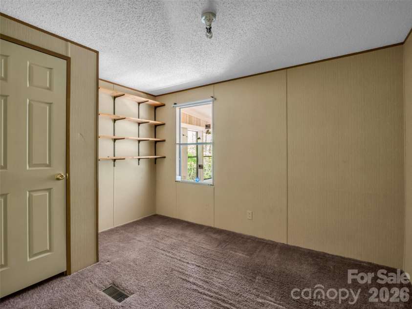 203 Rogat Road, Hendersonville, NC 28792.  MLS# CAR4375541, YatesRealty ID 18365. 
