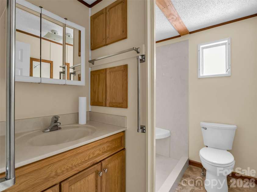 203 Rogat Road, Hendersonville, NC 28792.  MLS# CAR4375541, YatesRealty ID 18365. 