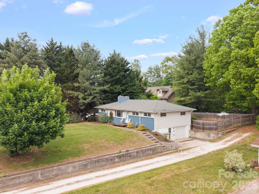 36 Acton Woods Road, Candler, NC 28715.  MLS# CAR4373953, YatesRealty ID 18368. 