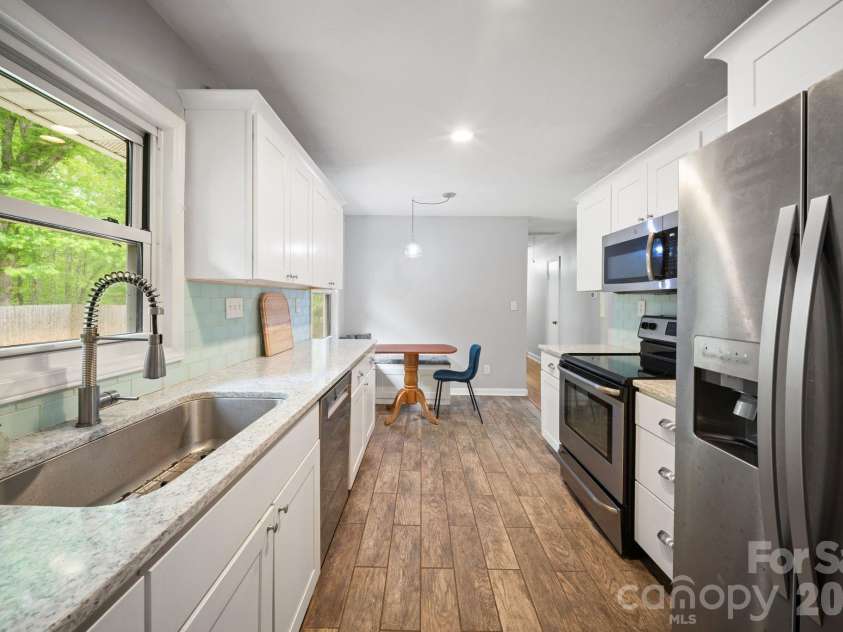 36 Acton Woods Road, Candler, NC 28715.  MLS# CAR4373953, YatesRealty ID 18368. 