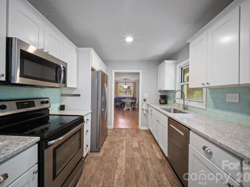 36 Acton Woods Road, Candler, NC 28715.  MLS# CAR4373953, YatesRealty ID 18368. 