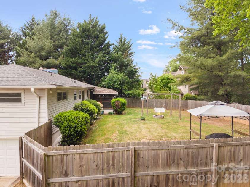 36 Acton Woods Road, Candler, NC 28715.  MLS# CAR4373953, YatesRealty ID 18368. 