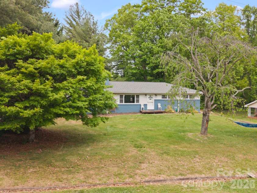 36 Acton Woods Road, Candler, NC 28715.  MLS# CAR4373953, YatesRealty ID 18368. 