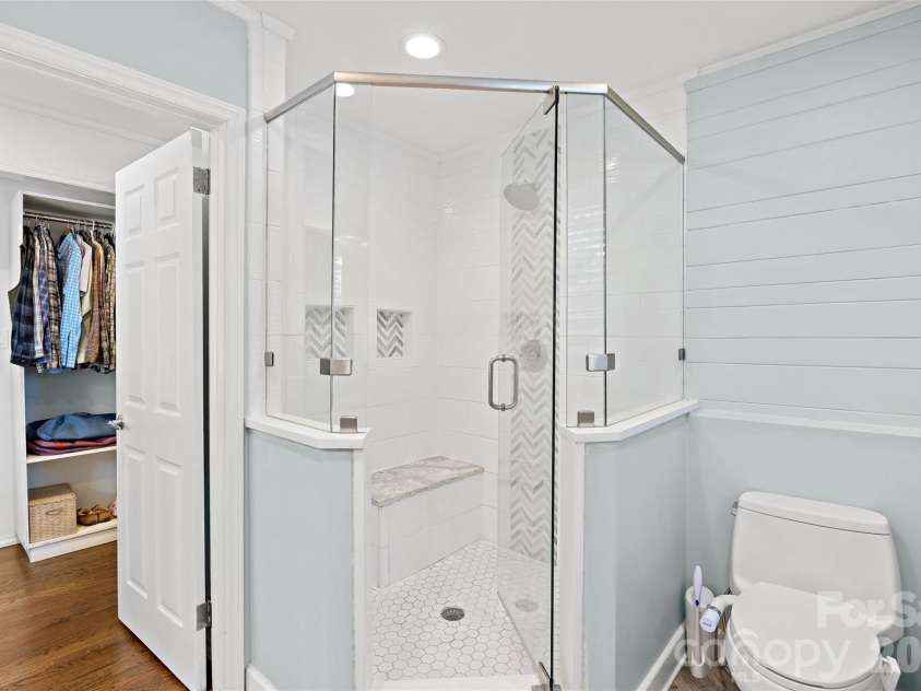 832 Stanfield Drive, Charlotte, NC 28210.  MLS# CAR4369316, YatesRealty ID 18372. Frameless shower