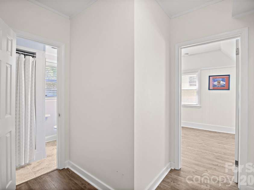832 Stanfield Drive, Charlotte, NC 28210.  MLS# CAR4369316, YatesRealty ID 18372. Lower level hallway