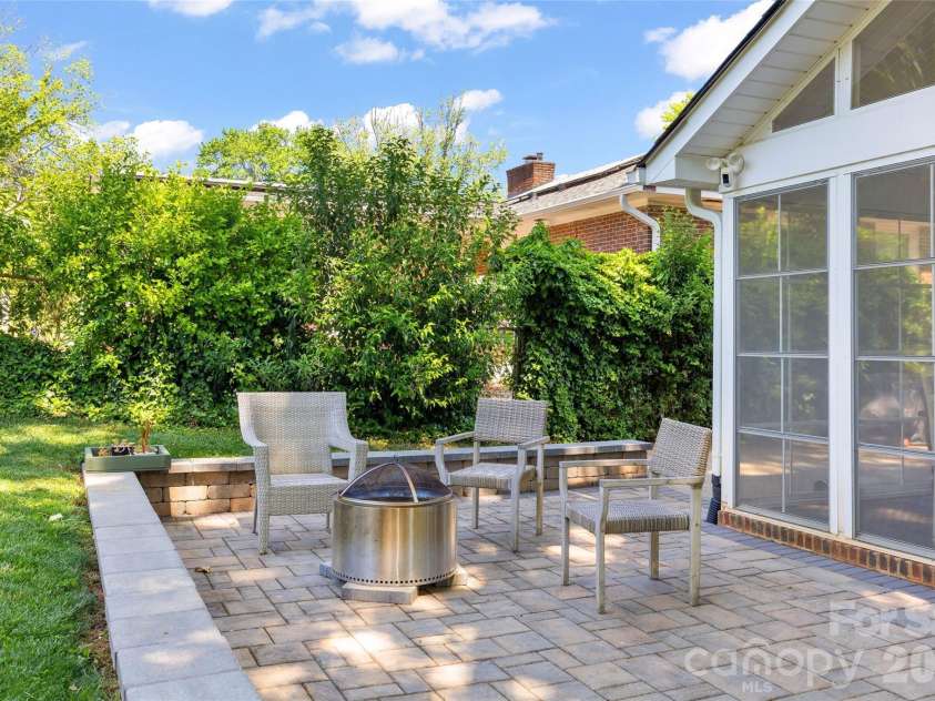 832 Stanfield Drive, Charlotte, NC 28210.  MLS# CAR4369316, YatesRealty ID 18372. Paver patio