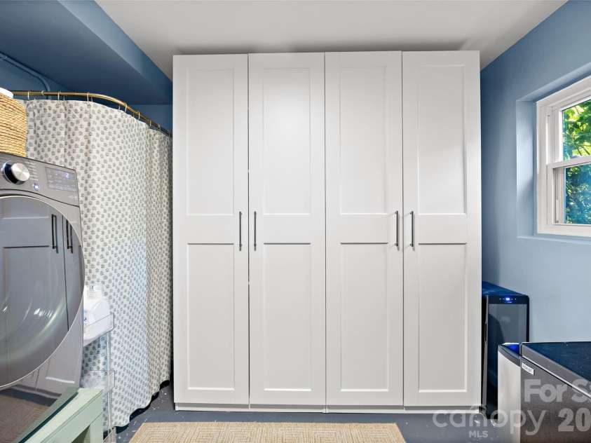 832 Stanfield Drive, Charlotte, NC 28210.  MLS# CAR4369316, YatesRealty ID 18372. Wonderful storage in laundry