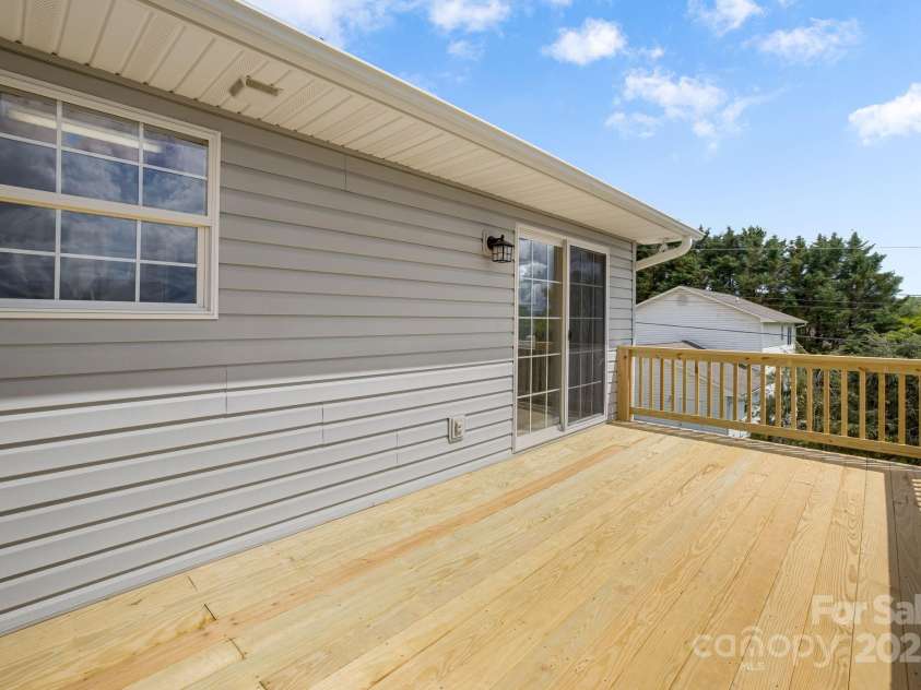 87 Collins Road, Marshall, NC 28753.  MLS# CAR4267470, YatesRealty ID 18372. 