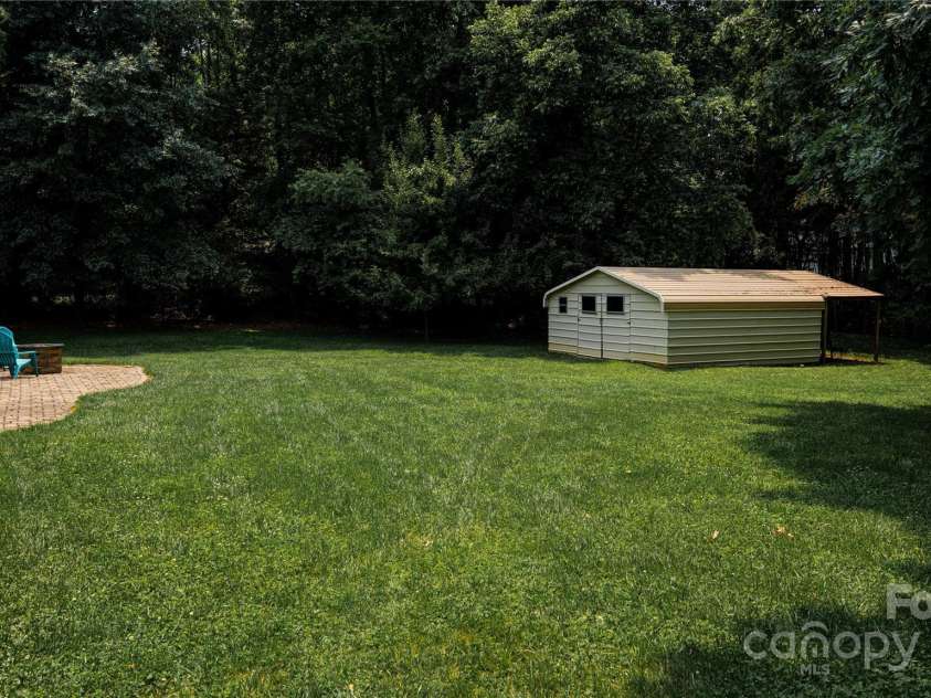 3273 16th Street, Hickory, NC 28601.  MLS# CAR4265590, YatesRealty ID 18373. Back yard and Shed