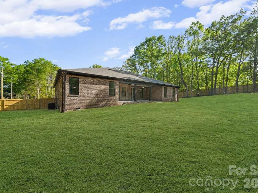 311 Hudson Drive, Harrisburg, NC 28075.  MLS# CAR4333304, YatesRealty ID 18374. 