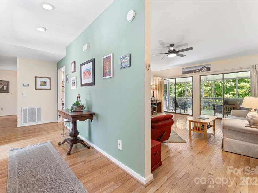 60 Holly Ridge Road, Pisgah Forest, NC 28768.  MLS# CAR4171351, YatesRealty ID 18375. Entry to living room