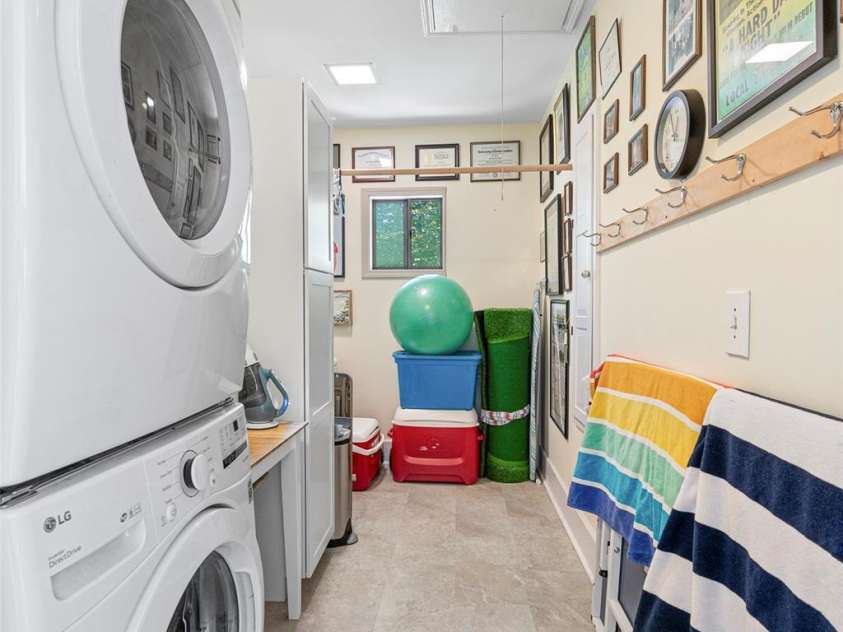 60 Holly Ridge Road, Pisgah Forest, NC 28768.  MLS# CAR4171351, YatesRealty ID 18375. Laundry room on main floor