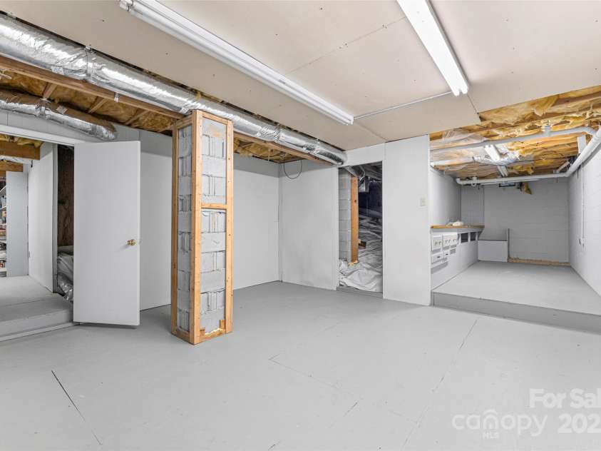 60 Holly Ridge Road, Pisgah Forest, NC 28768.  MLS# CAR4171351, YatesRealty ID 18375. Lots of storage