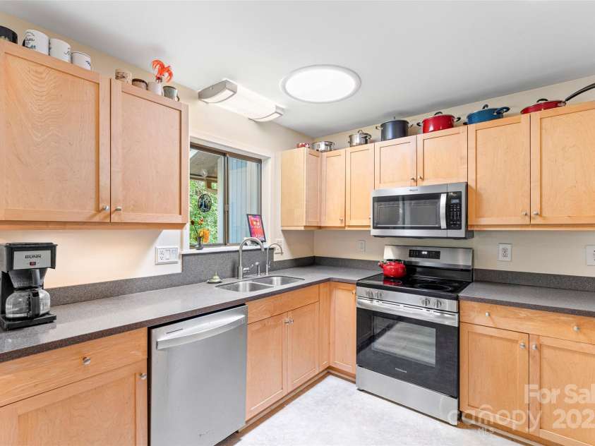 60 Holly Ridge Road, Pisgah Forest, NC 28768.  MLS# CAR4171351, YatesRealty ID 18375. Remodeled kitchen