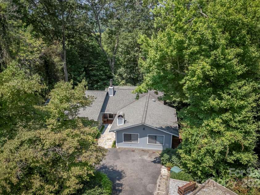 60 Holly Ridge Road, Pisgah Forest, NC 28768.  MLS# CAR4171351, YatesRealty ID 18375. Surrounded by trees and nature