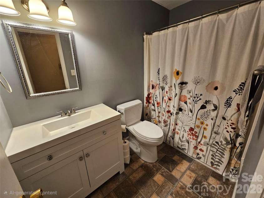 1982 Old Farm Road, Concord, NC 28025.  MLS# CAR4367024, YatesRealty ID 18376. Full Bathroom. **AI generated to remove camera tripod from mirror. 