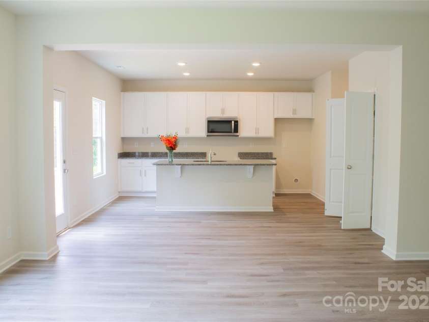 7601 Hammond Drive, Charlotte, NC 28215.  MLS# CAR4267514, YatesRealty ID 18378. Double door pantry (see open doors)