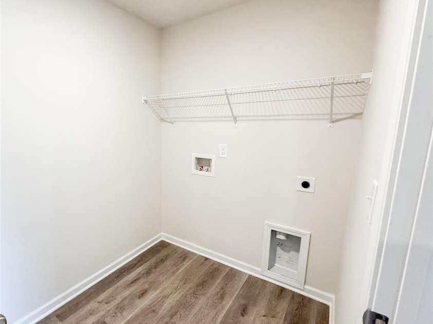 7601 Hammond Drive, Charlotte, NC 28215.  MLS# CAR4267514, YatesRealty ID 18378. Laundry room on upper level