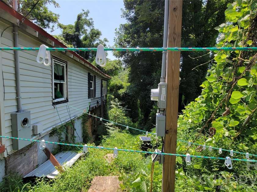 160 Cleveland Road, Tryon, NC 28782.  MLS# CAR4274322, YatesRealty ID 1838. Right of structure