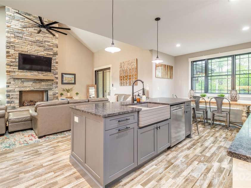 45 Erin Glen Court, Fairview, NC 28730.  MLS# CAR4239316, YatesRealty ID 18382. High ceilings and sky lights in the great room. This is the view from the kitchen.