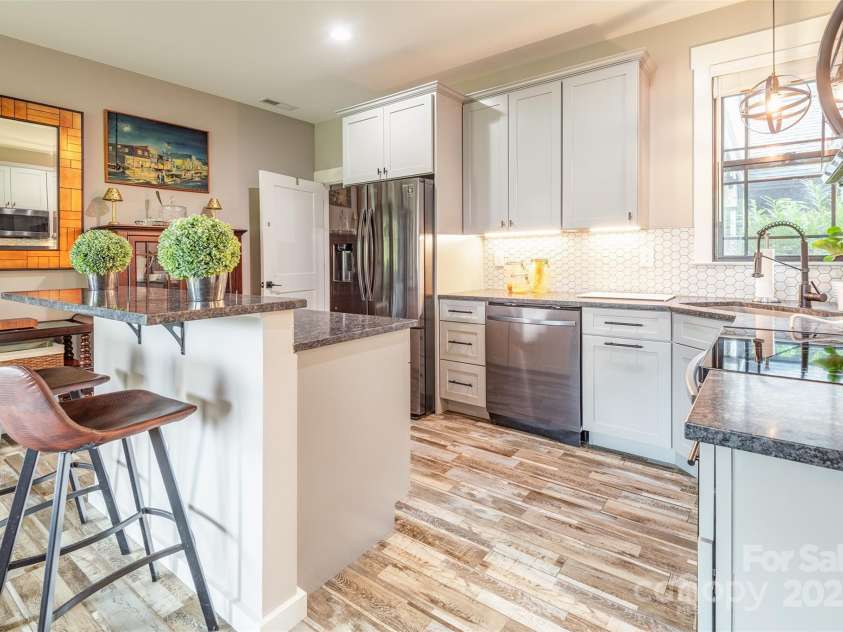 45 Erin Glen Court, Fairview, NC 28730.  MLS# CAR4239316, YatesRealty ID 18382. In law suite kitchen and sitting area